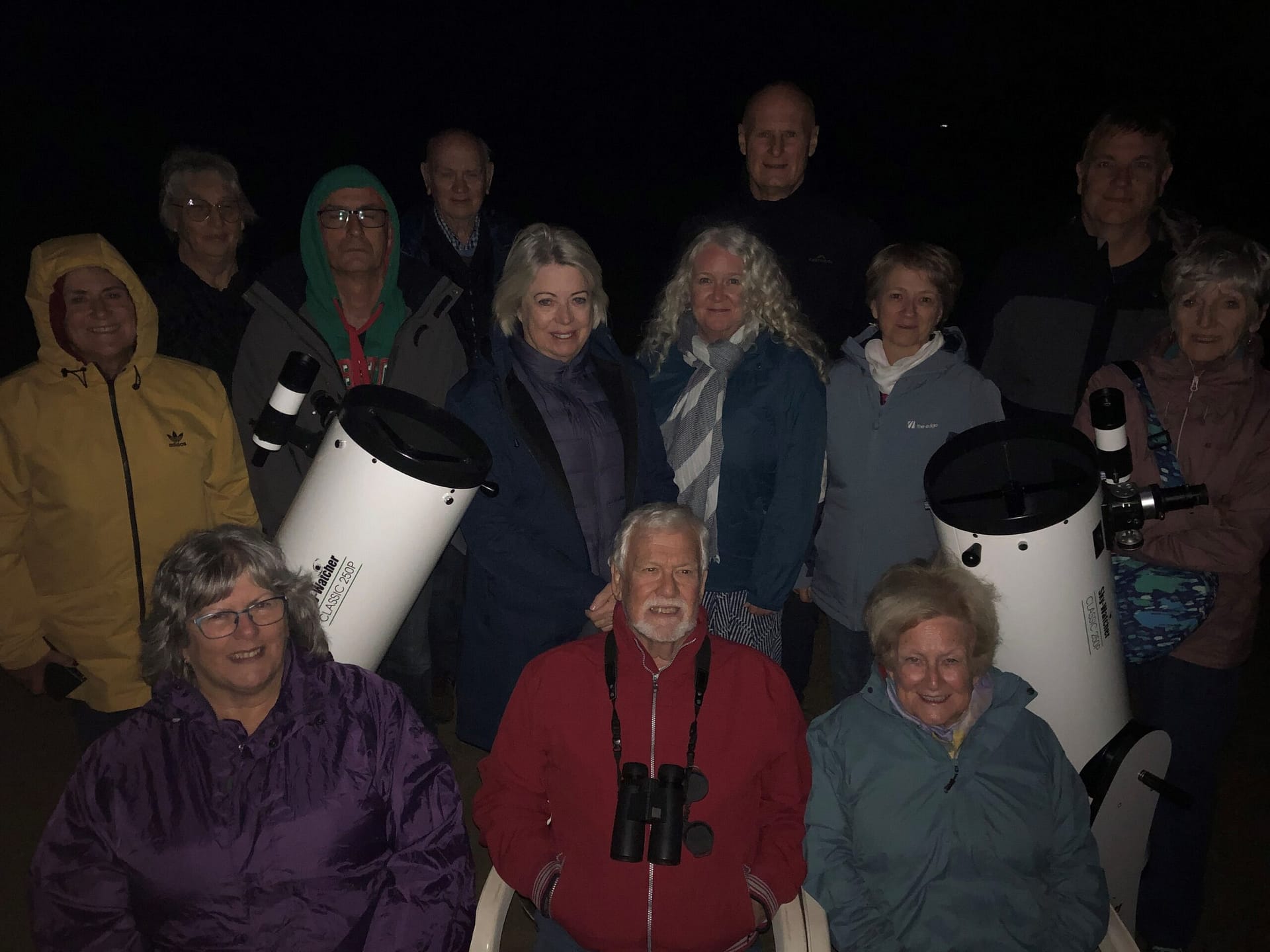 Astronomy enthusiasts viewing the night sky